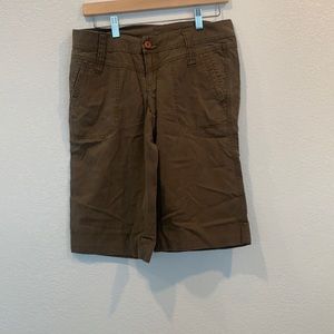 Olive green, lyocell fabric shorts- Bermuda length. Size 5. Rubbish.